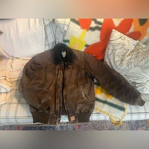 Distressed brown carhartt men’s bomber workwear jacket